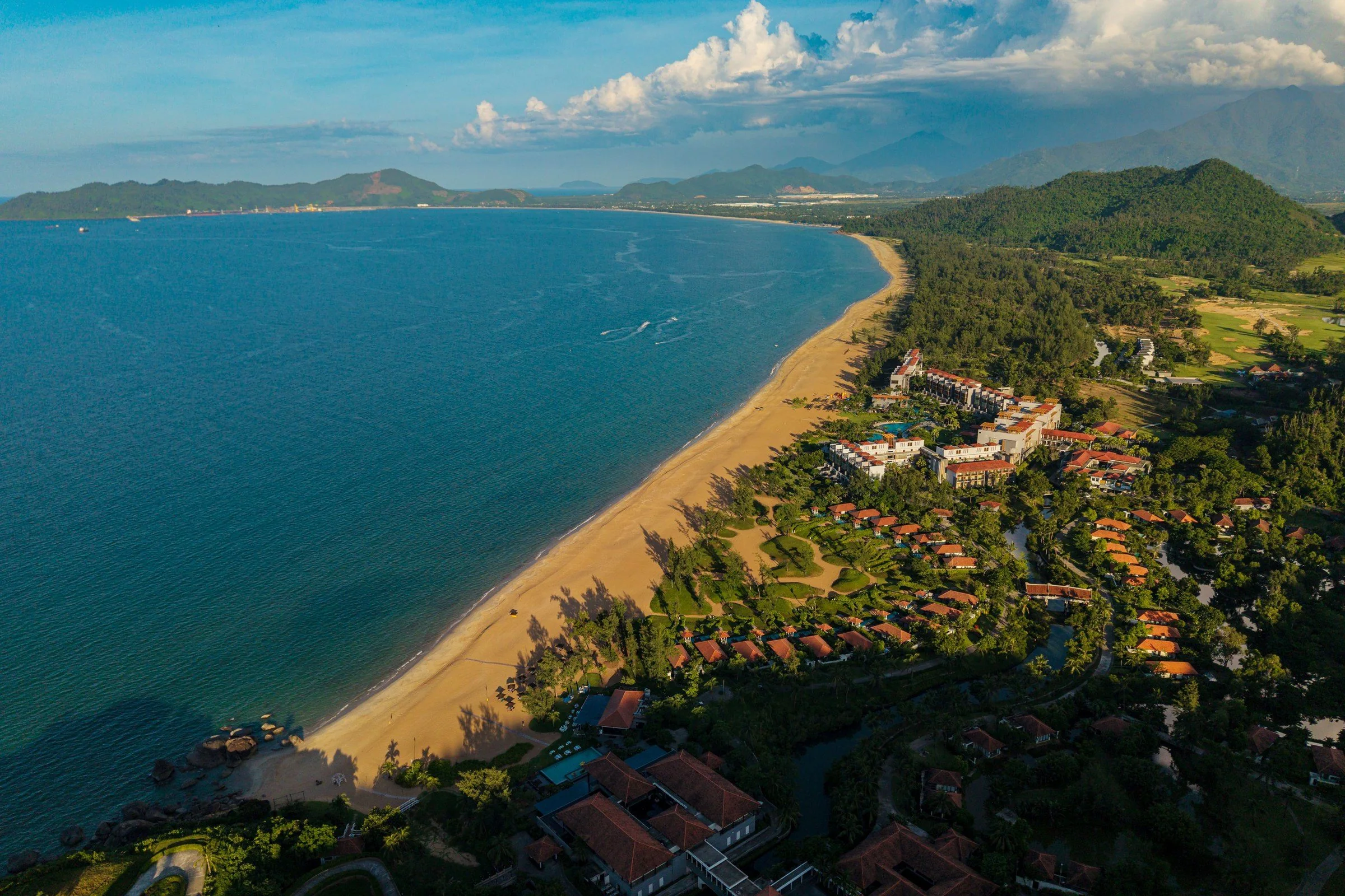 Aerial view of Angsana Lang Co resort and beach at golden hour