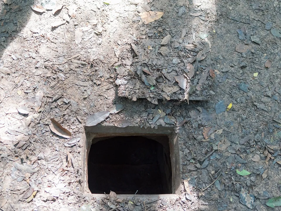 Entrance to a Cu Chi tunnel in the forest floor