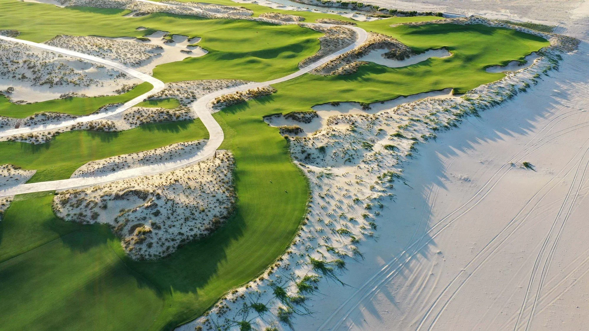 Aerial view of Hoiana Shores Golf Club dunes and oceanfront fairways near Hoi An