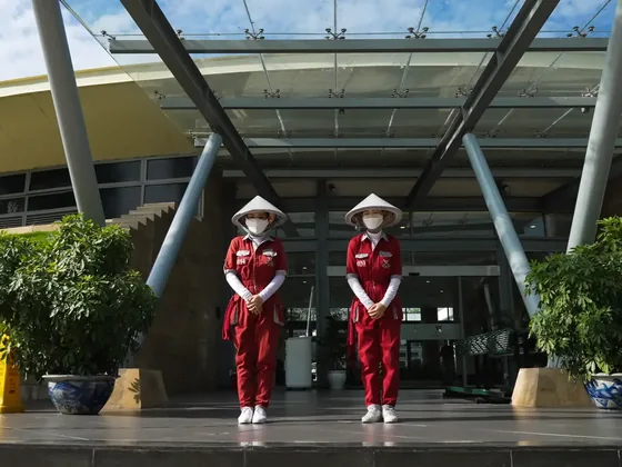 Caddies at the clubhouse: Part of every round in Vietnam