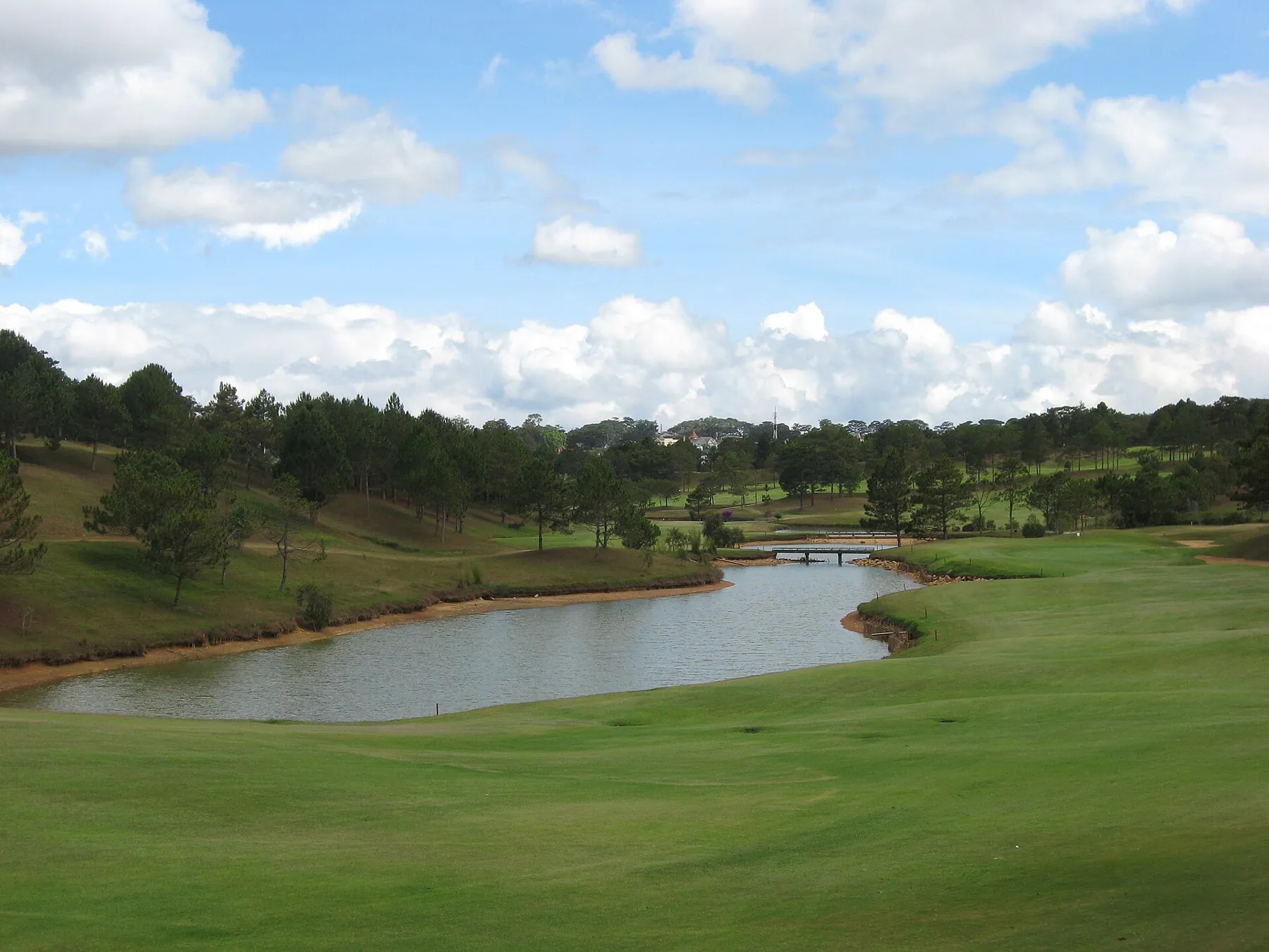 Lake and pine-lined fairways at Dalat Palace Golf Club