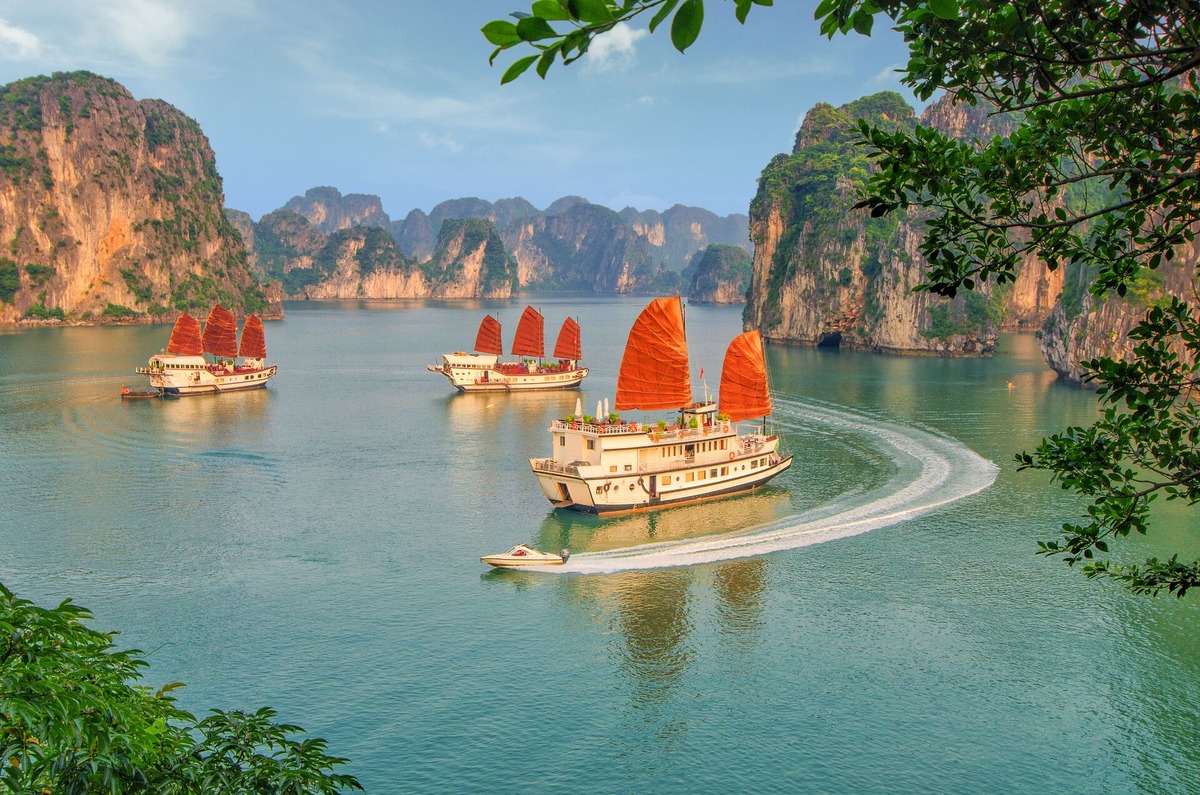 Ha Long Bay luxury cruise boats among limestone karst islands