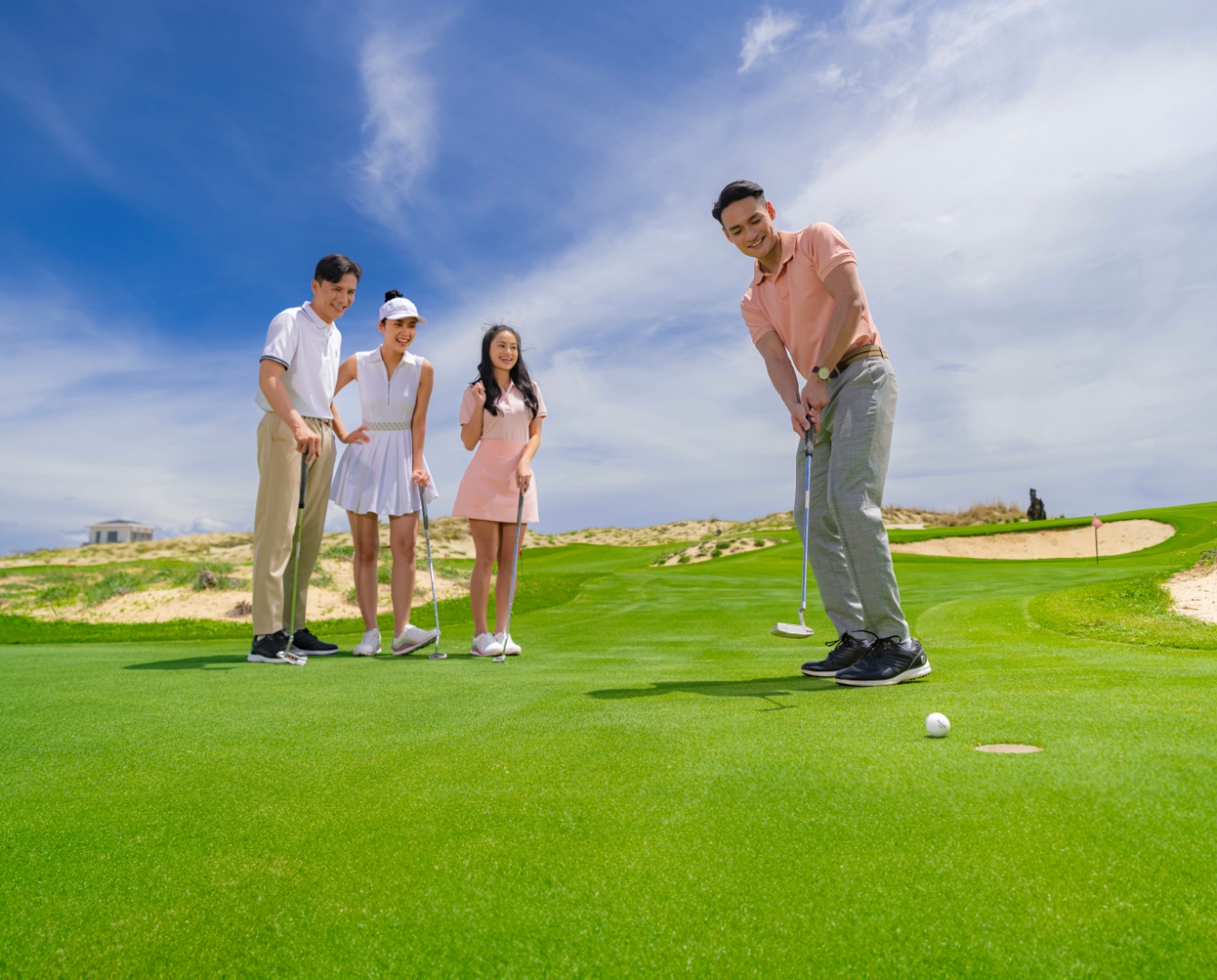 Group of golfers on a green in Vietnam